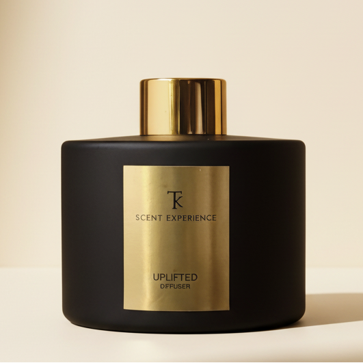 Uplifted reed diffuser with grapefruit, lemon and honeysuckle styled in an elegant entryway